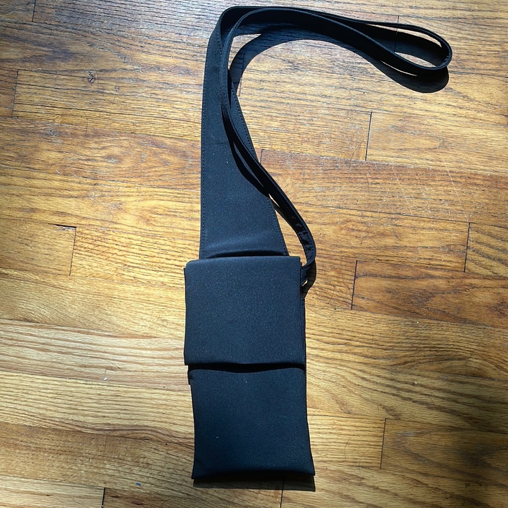 Black sleek Crossbody nylon bag.